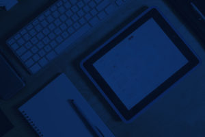 blue background with laptop and tablet